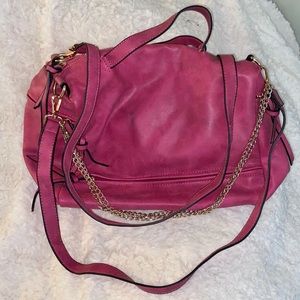 Hot pink messenger bag with gold chains